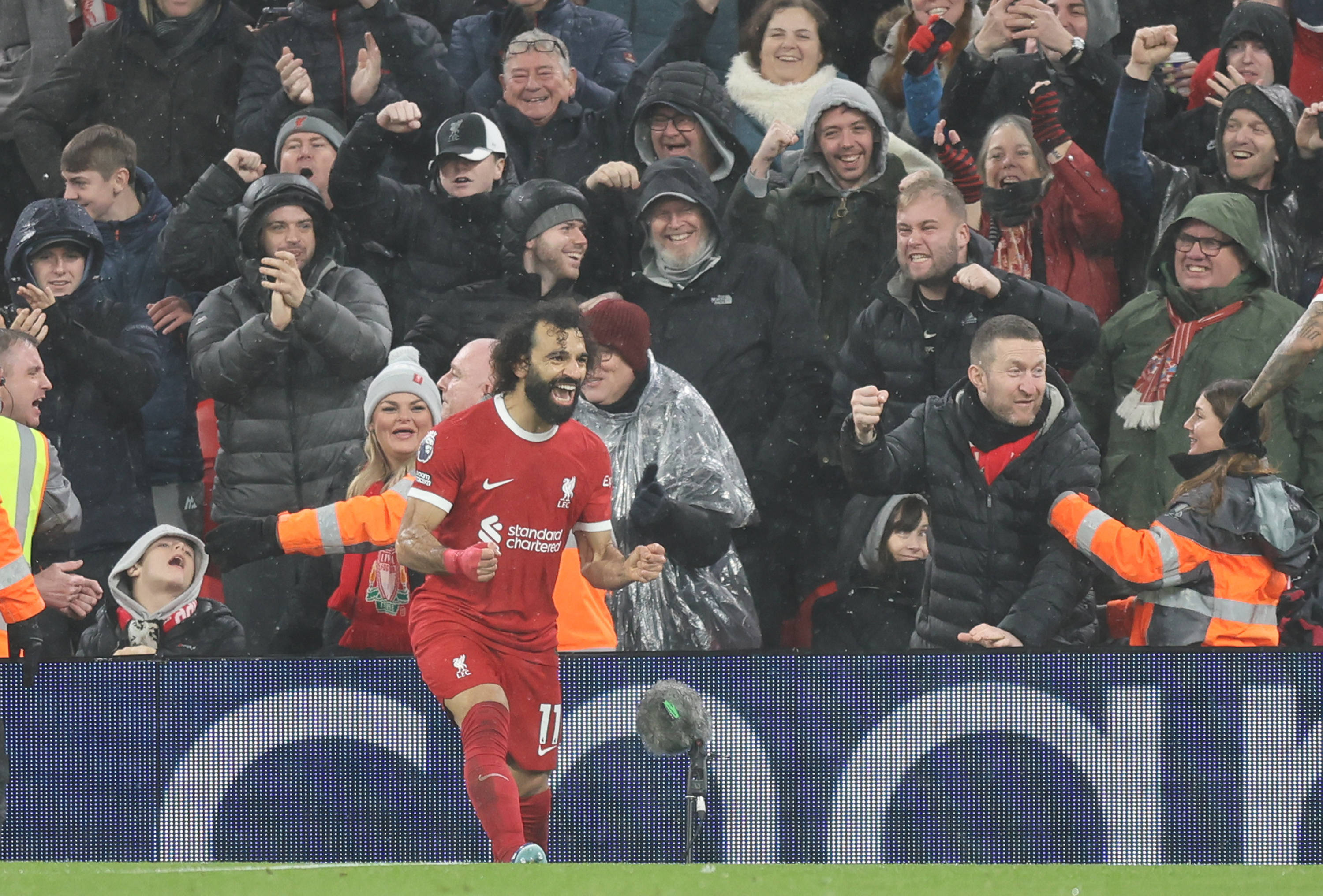 Mo Salah pictured celebrating after scoring his 150th Premier League goal for Liverpool, during a home game against Newcastle United in January 2024