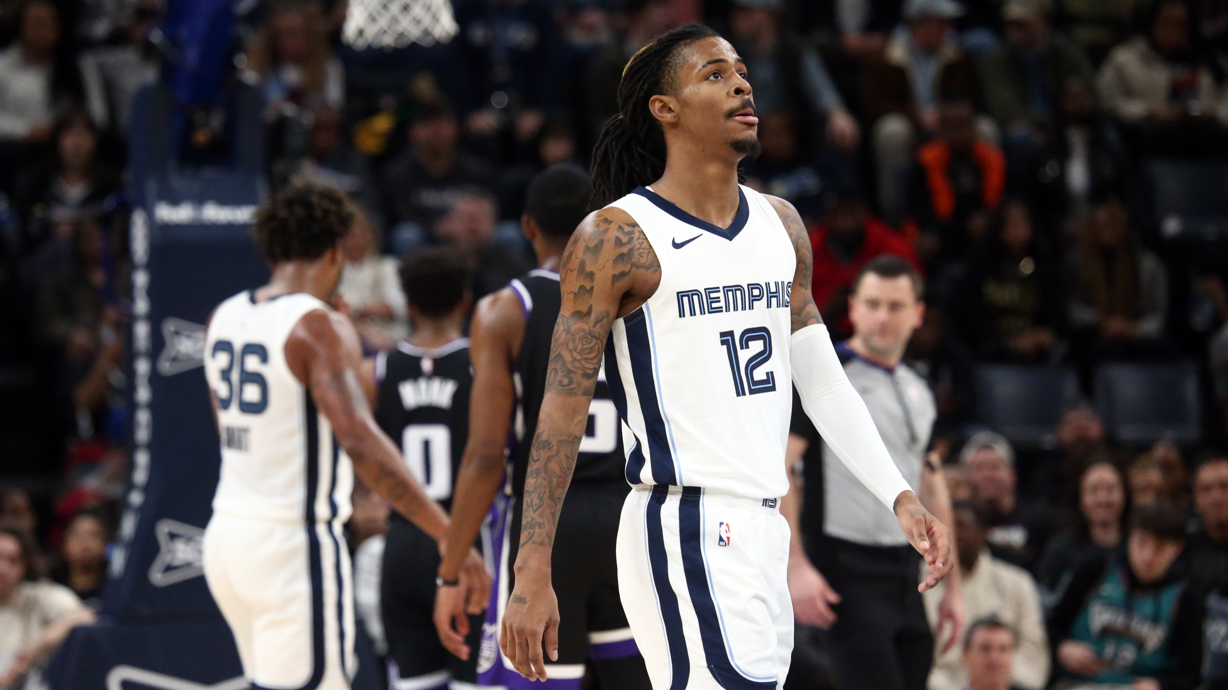 Memphis Grizzlies guard Ja Morant reacts during a game against the Sacramento Kings.