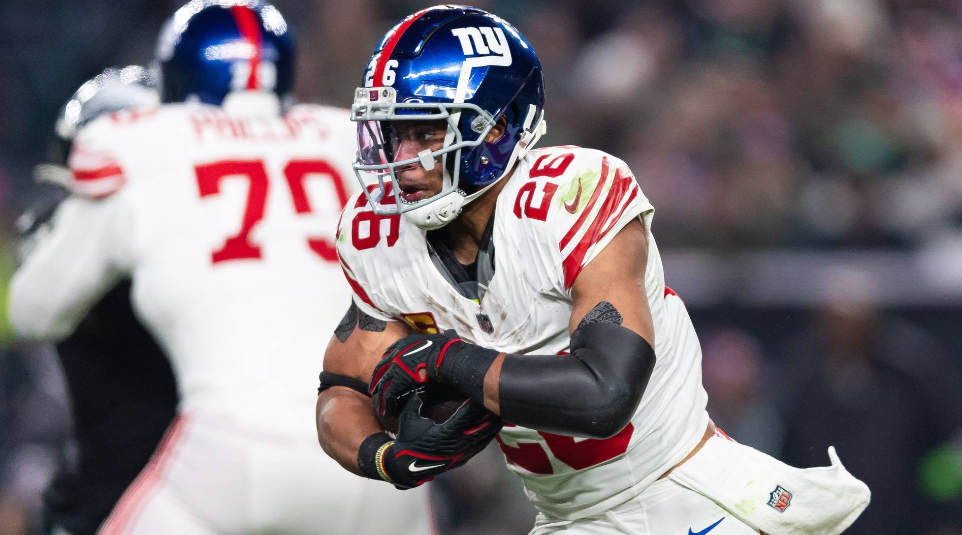 Giants running back Saquon Barkley runs the ball in a game vs. the Eagles.
