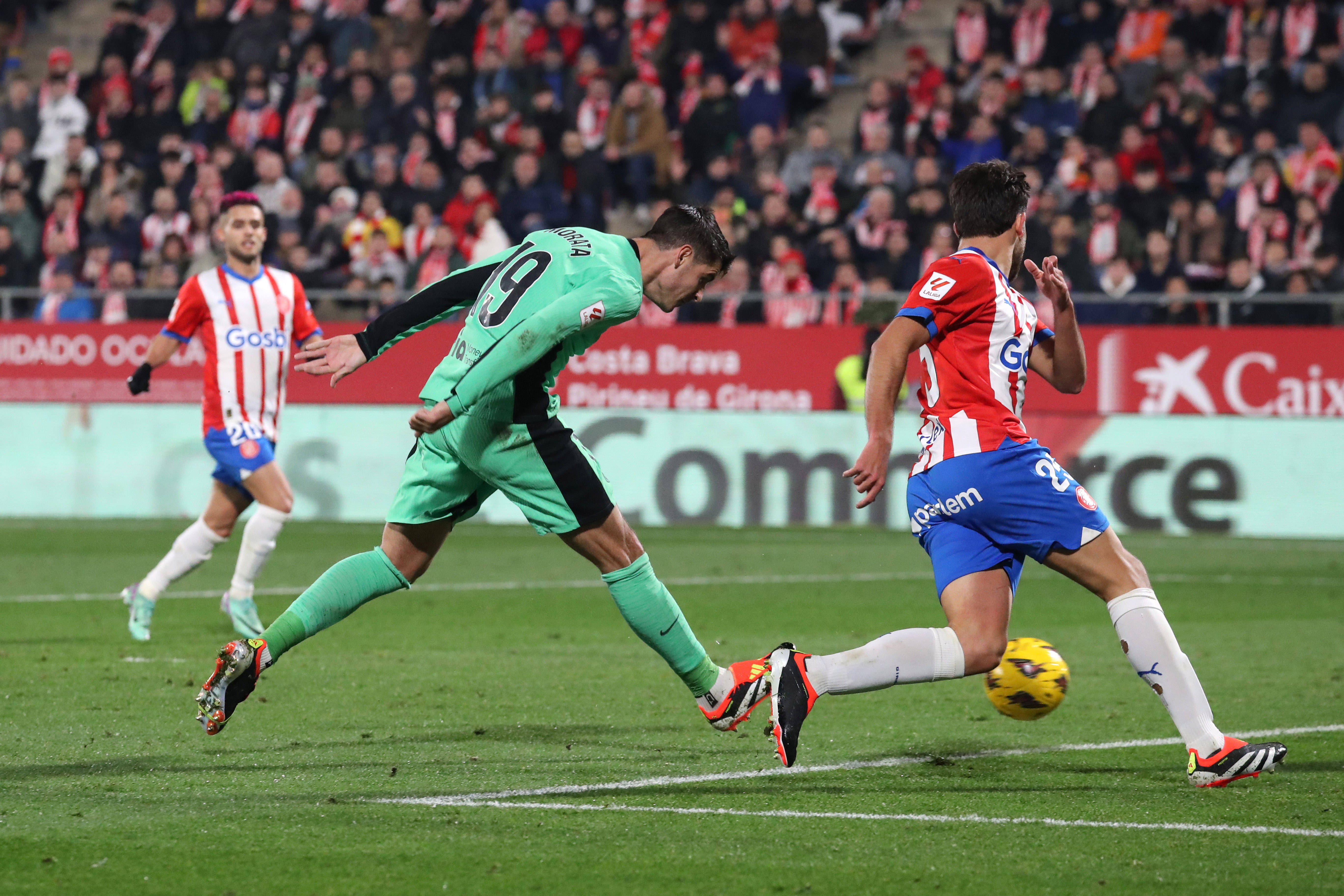 Alvaro Morata pictured (center) scoring a goal for Atletico Madrid during a 4-3 loss at Girona in January 2024