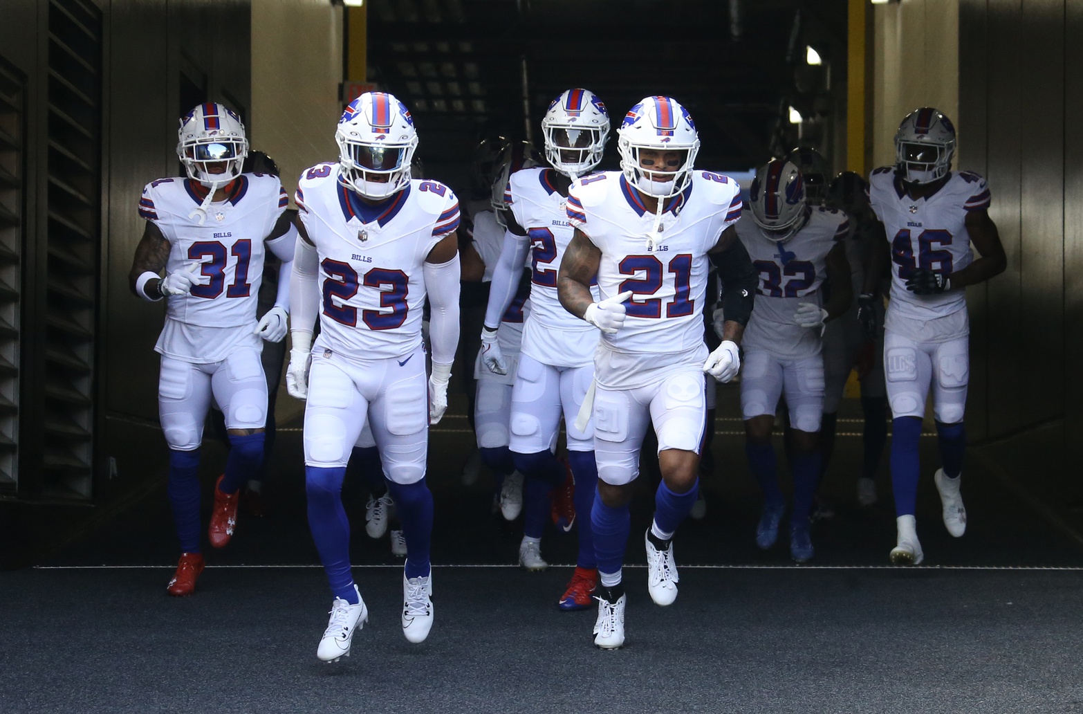 Aug 19, 2023; Pittsburgh, Pennsylvania, USA; The Buffalo Bills safeties Dean Marlowe (31) and Micah Hyde (23) and Jordan Poyer (21) take the field to warm up before the game against the Pittsburgh Steelers at Acrisure Stadium.