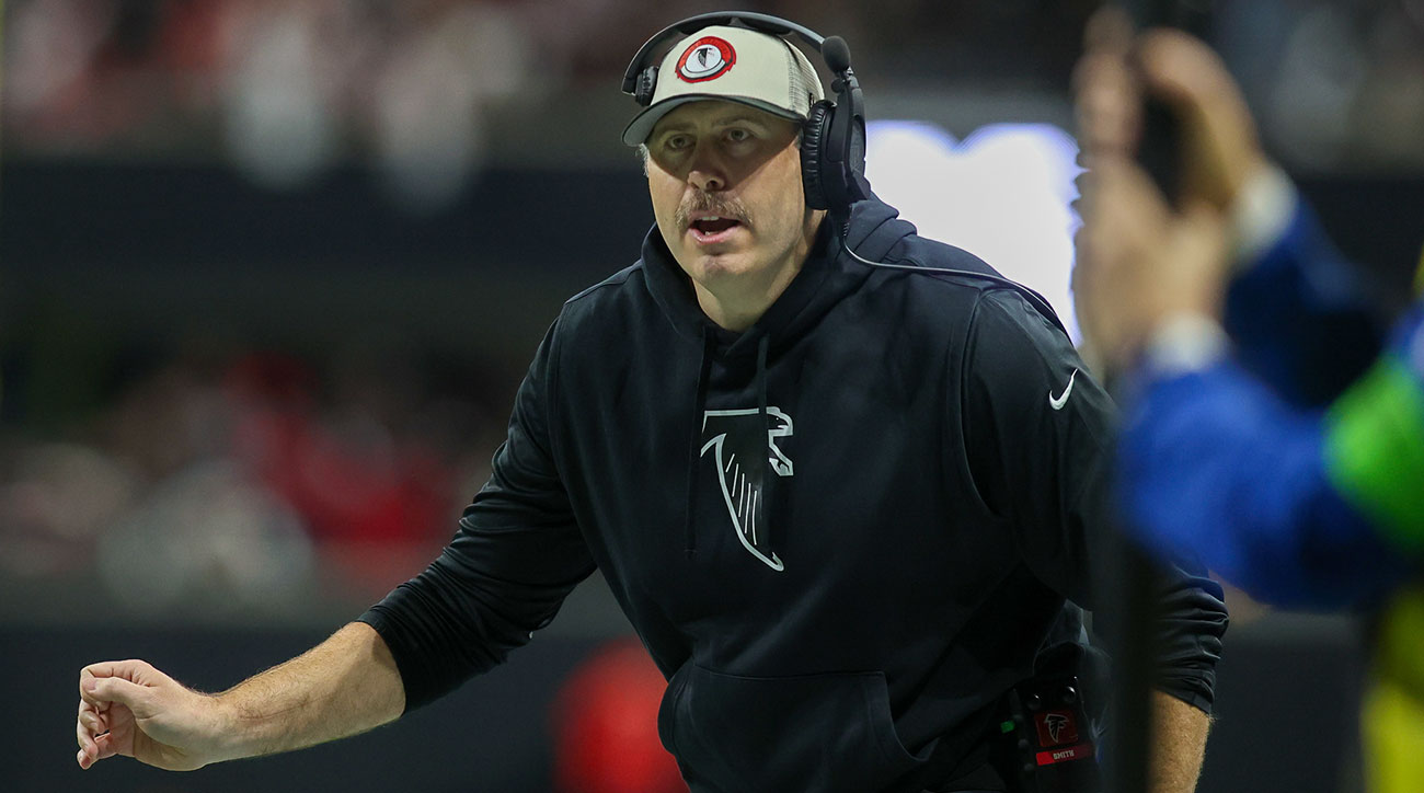 Falcons coach Arthur Smith on the sideline with a headset on