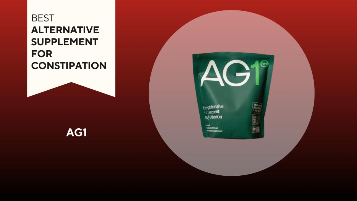 A green bag of AG1 against a red background.