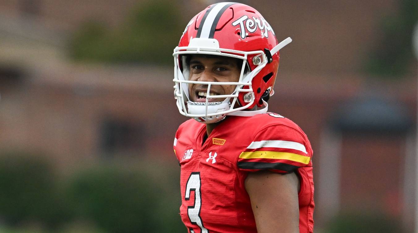 Maryland quarterback Taulia Tagovailoa smiles while playing in a game.