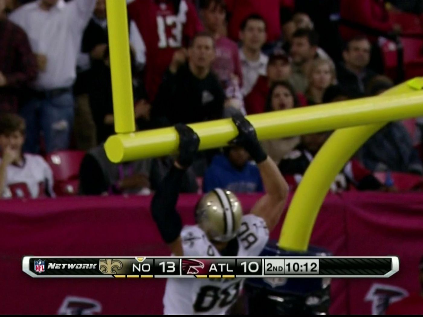 Saints TE Jimmy Graham bends the goal posts after a 2013 touchdown against the Atlanta Falcons. Credit: USA TODAY 
