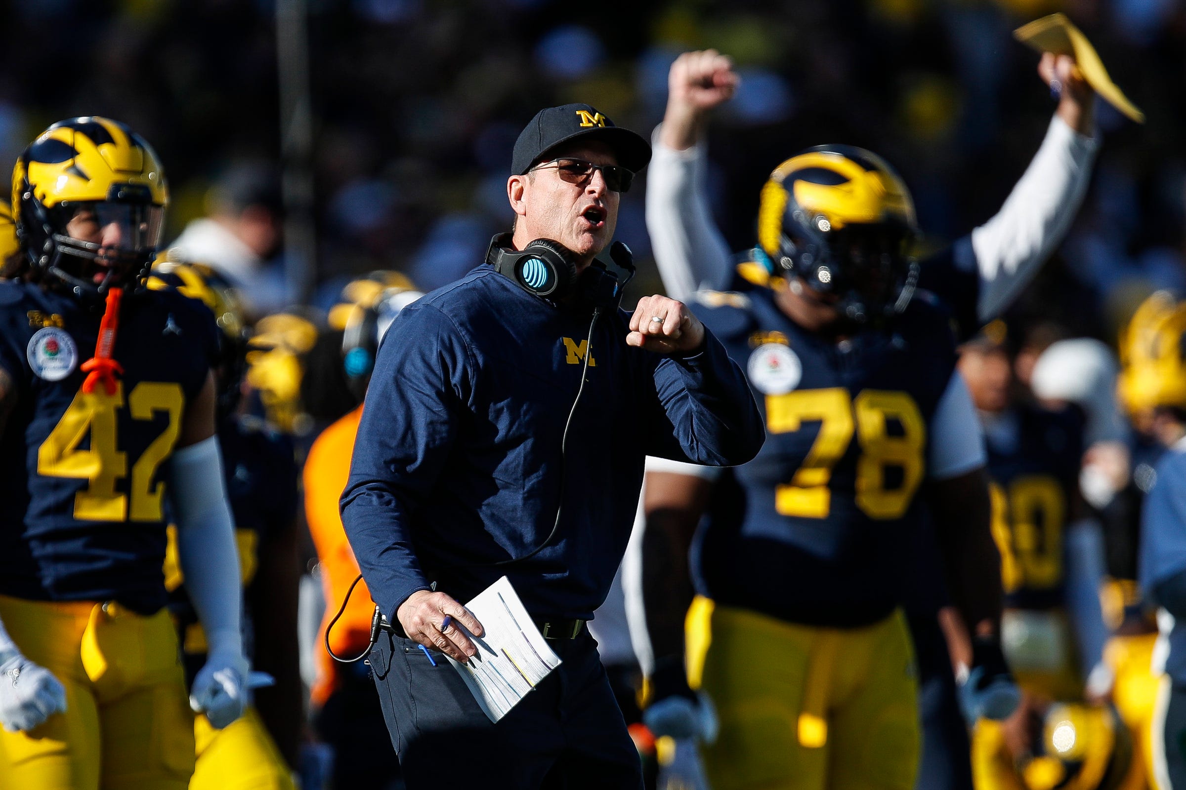 Michigan coach Jim Harbaugh reacts to a play during the Rose Bowl