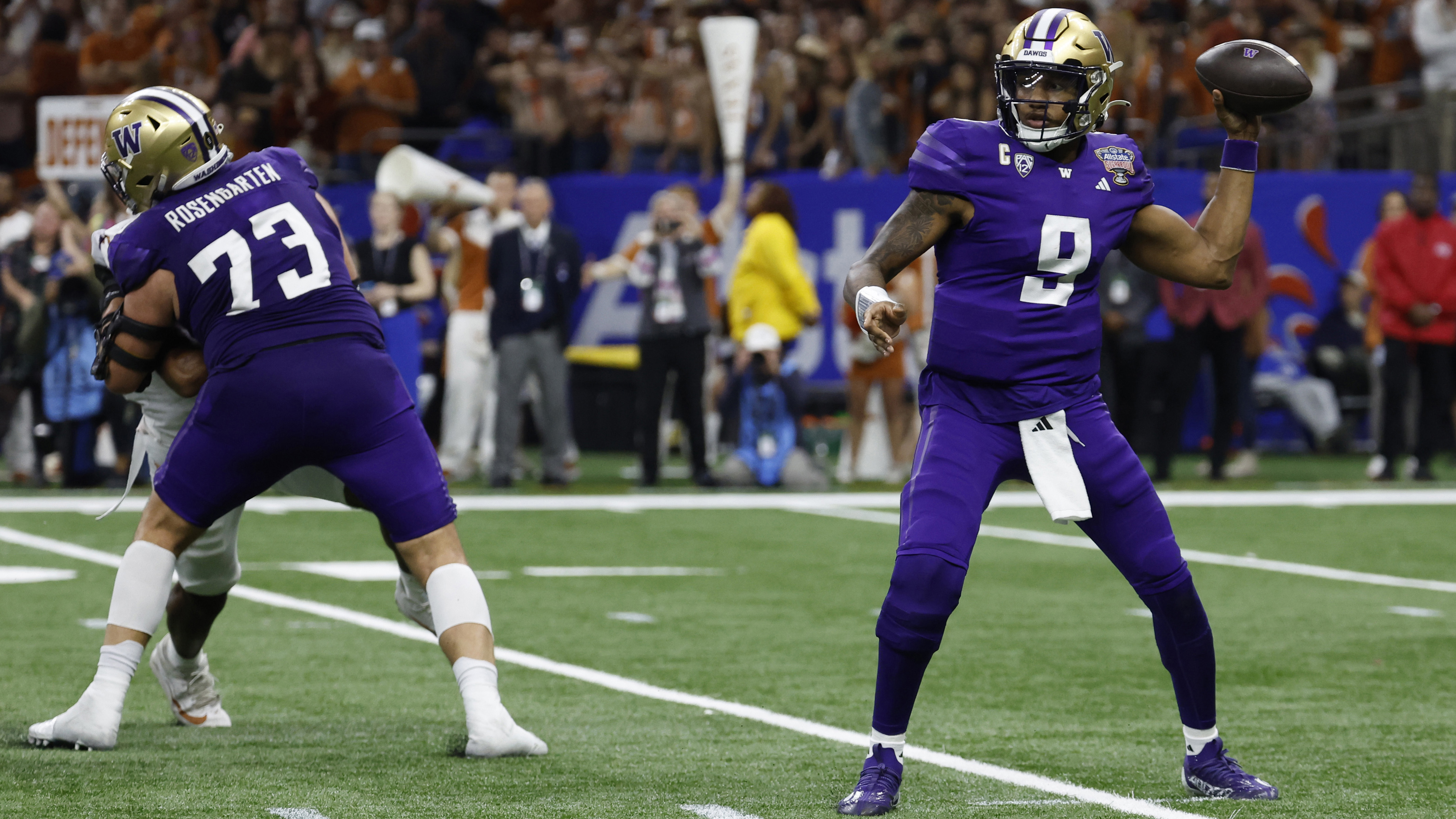 Washington Huskies quarterback Michael Penix Jr. passes the ball against the Texas Longhorns in the 2024 Sugar Bowl.