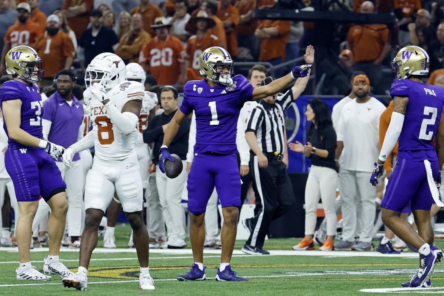 Washington Huskies wide receiver Rome Odunze (1) reacts after a play against the Texas Longhorns during the second quarter of the 2024 Sugar Bowl college football playoff semifinal game at Caesars Superdome. 