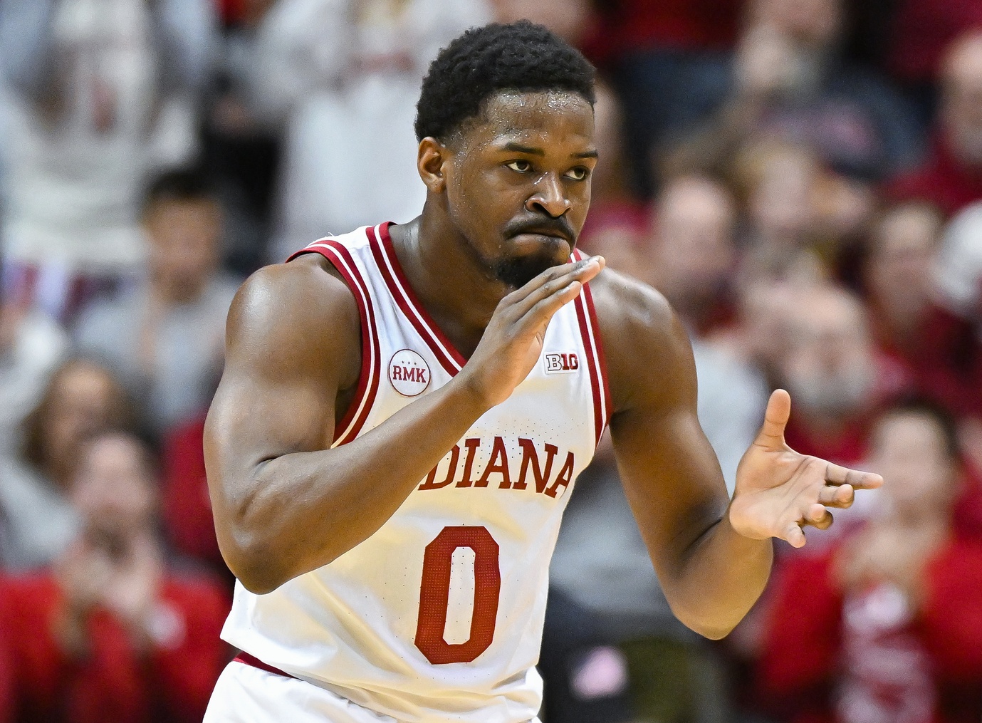 Indiana Hoosiers guard Xavier Johnson (0) claps his hands after a play against the Ohio State Buckeyes.  