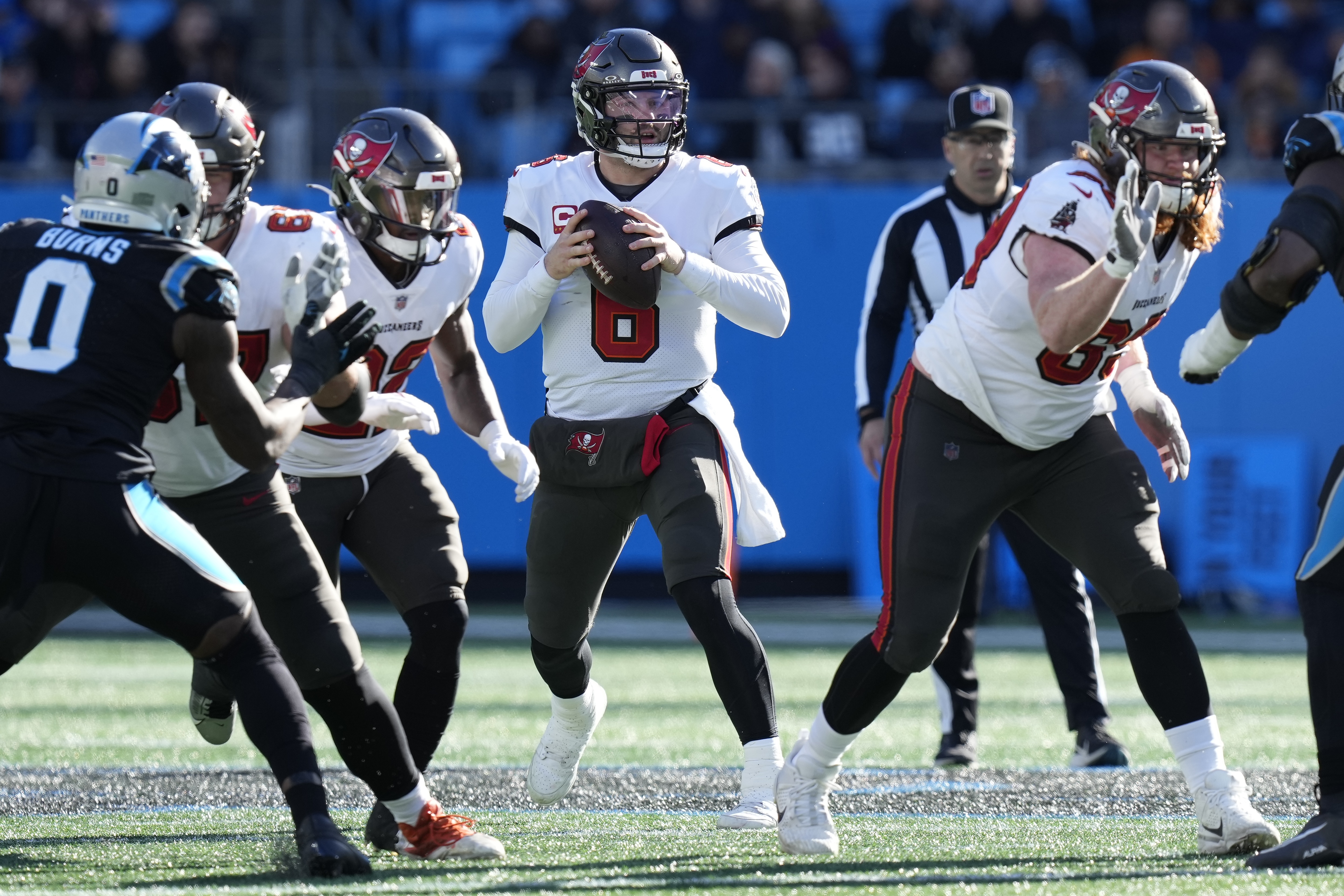 Jan 7, 2024; Charlotte, North Carolina, USA; Tampa Bay Buccaneers quarterback Baker Mayfield (6) drops back to pass against the Carolina Panthers during the second quarter at Bank of America Stadium. Mandatory Credit: Jim Dedmon-USA TODAY Sports