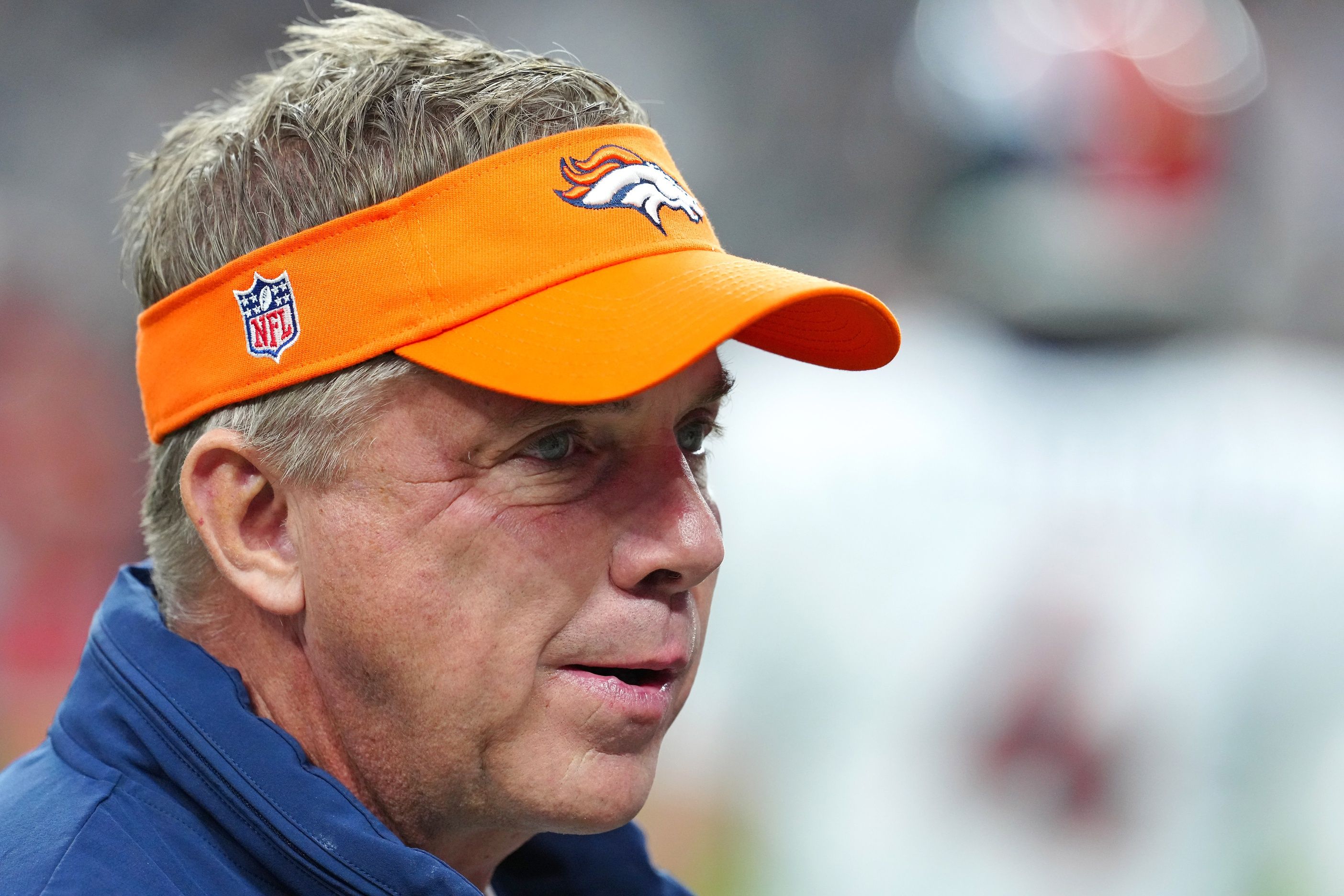 Denver Broncos head coach Sean Payton walks on the field before the start of a game against the Las Vegas Raiders at Allegiant Stadium.