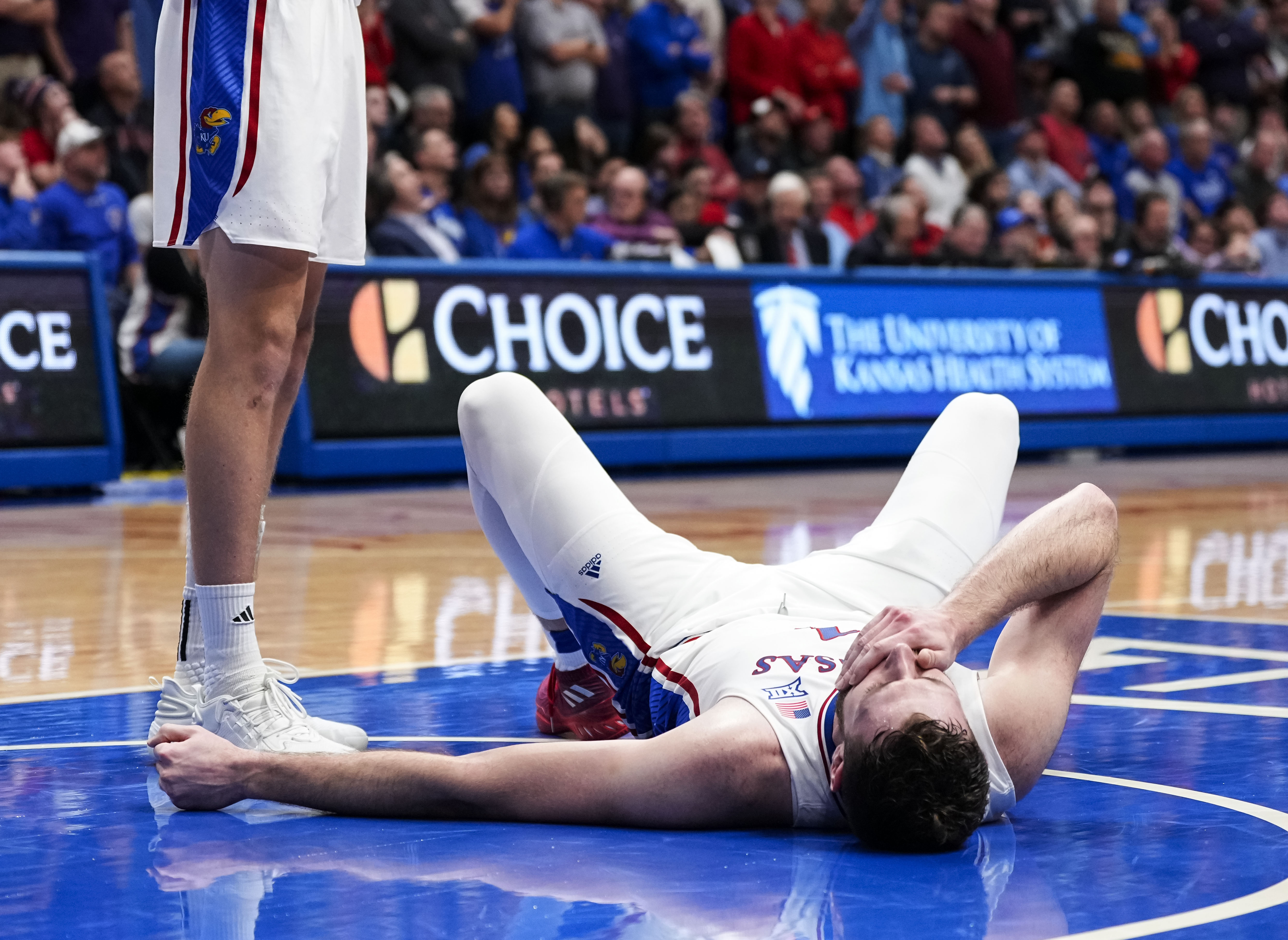 Jan 6, 2024; Lawrence, Kansas, USA; Kansas Jayhawks center Hunter Dickinson (1) reacts after a flagrant foul during the second half against the TCU Horned Frogs at Allen Fieldhouse. Mandatory Credit: Jay Biggerstaff-USA TODAY Sports