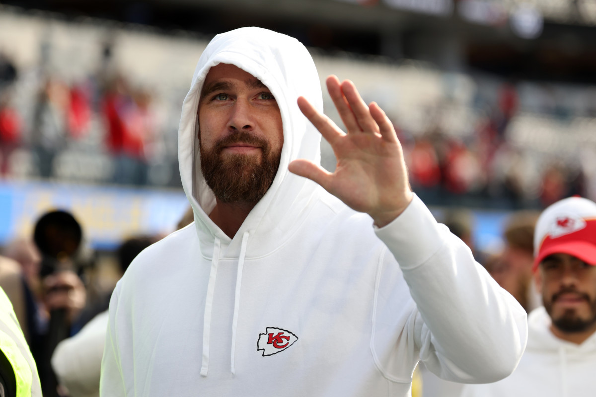 Kansas City Chiefs tight end Travis Kelce waves to fans before the game against the Los Angeles Chargers at SoFi Stadium.
