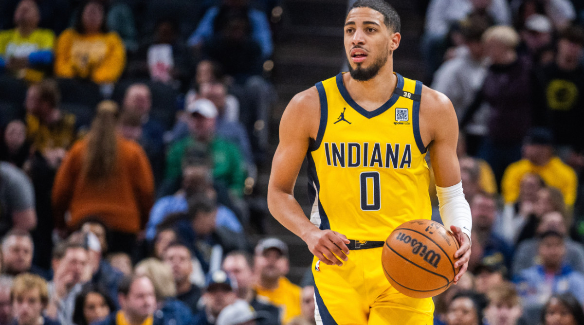 Jan 5, 2024; Indianapolis, Indiana, USA; Indiana Pacers guard Tyrese Haliburton (0) dribbles the ball in the first quarter against the Atlanta Hawks at Gainbridge Fieldhouse. Mandatory Credit: Trevor Ruszkowski-USA TODAY Sports  