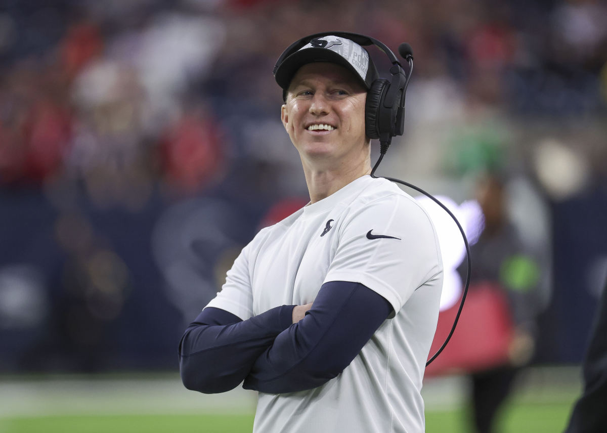 Houston Texans offensive coordinator Bobby Slowik smiles before the game against the Cleveland Browns at NRG Stadium.