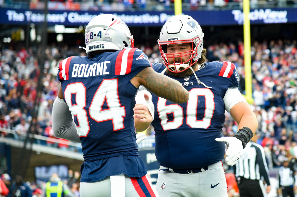 Oct 22, 2023; Foxborough, Massachusetts, USA; New England Patriots wide receiver Kendrick Bourne (84) and center David Andrews (60) celebrate after a touchdown during the second half against the Buffalo Bills at Gillette Stadium. 