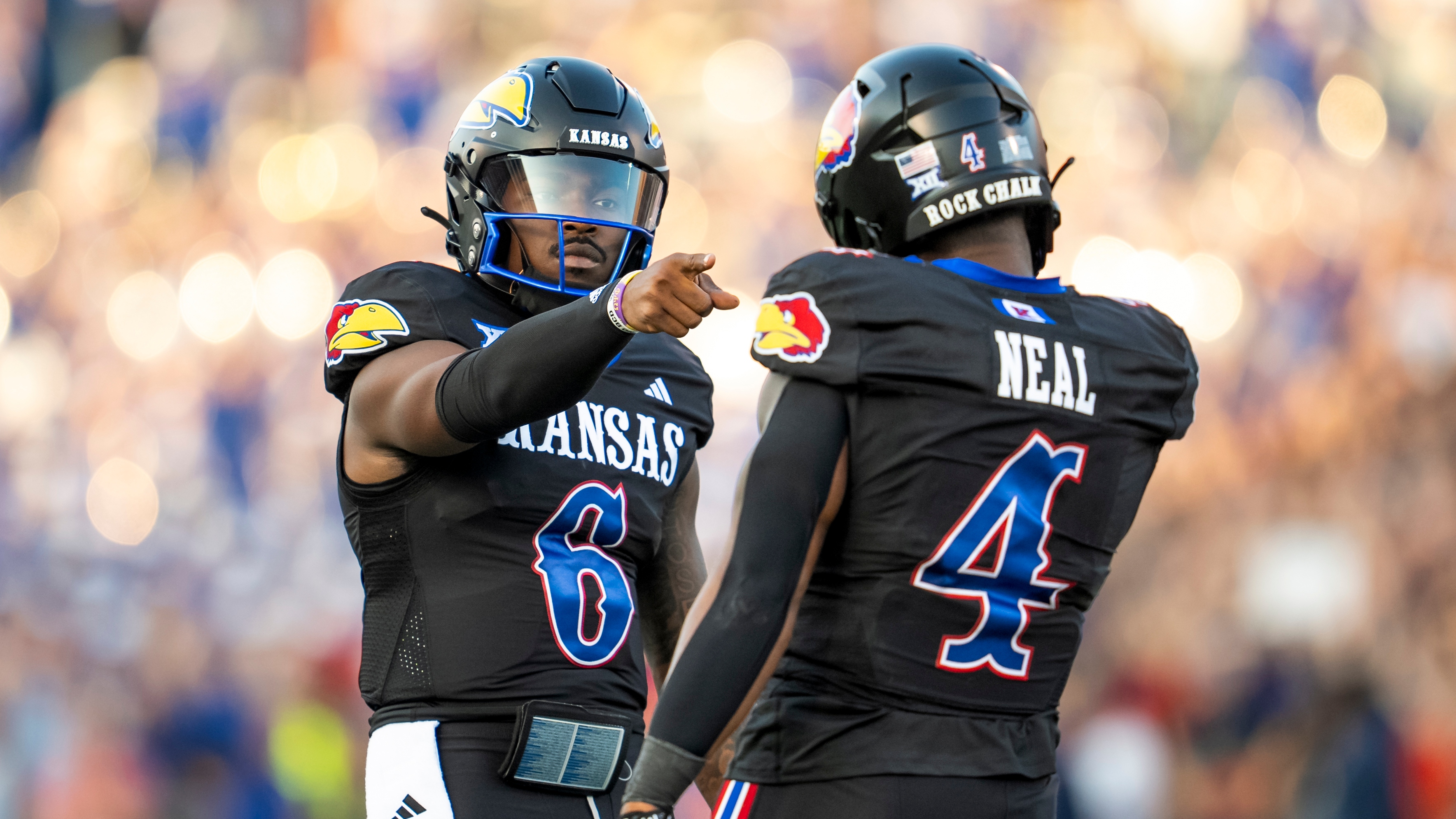 KansasJayhawks quarterback Jalon Daniels and running back Devin Neal