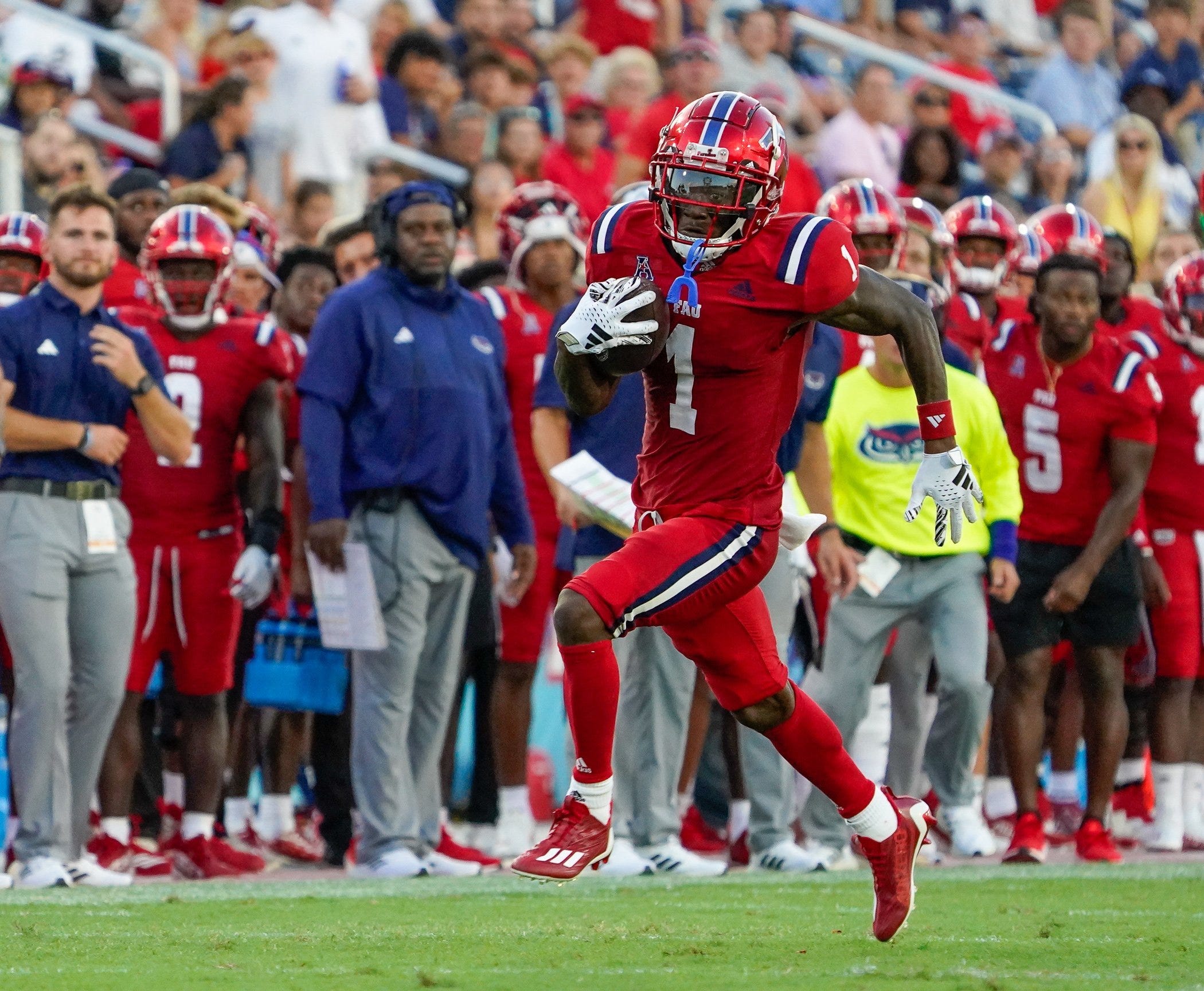 Florida Atlantic wide receiver LaJohntay Wester (1) looks for running room during a 42-20 victory over Monmouth at FAU Stadium on Saturday, September 2, 2023, in Boca Raton, FL