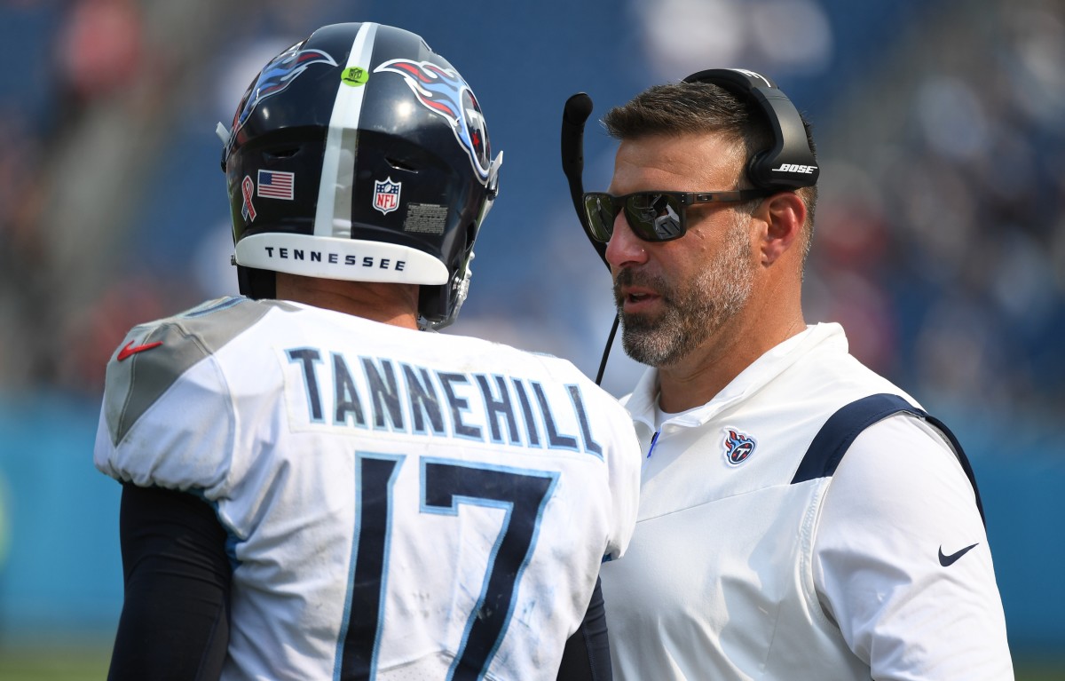 Sep 12, 2021; Nashville, Tennessee, USA; Tennessee Titans head coach Mike Vrabel talks with Tennessee Titans quarterback Ryan Tannehill (17) during the second half against the Arizona Cardinals at Nissan Stadium. 