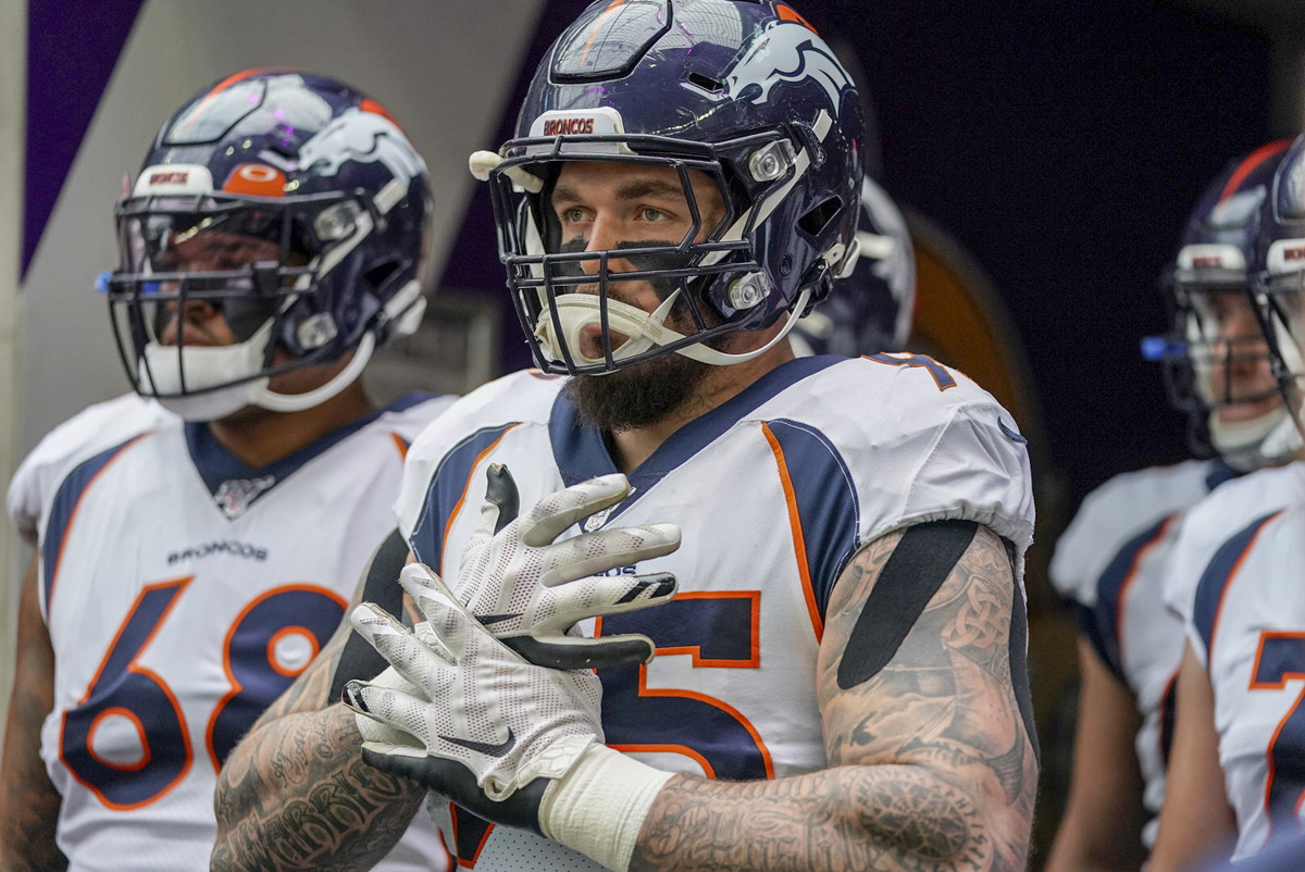 Derek Wolfe stands before a game in his Broncos uniform.