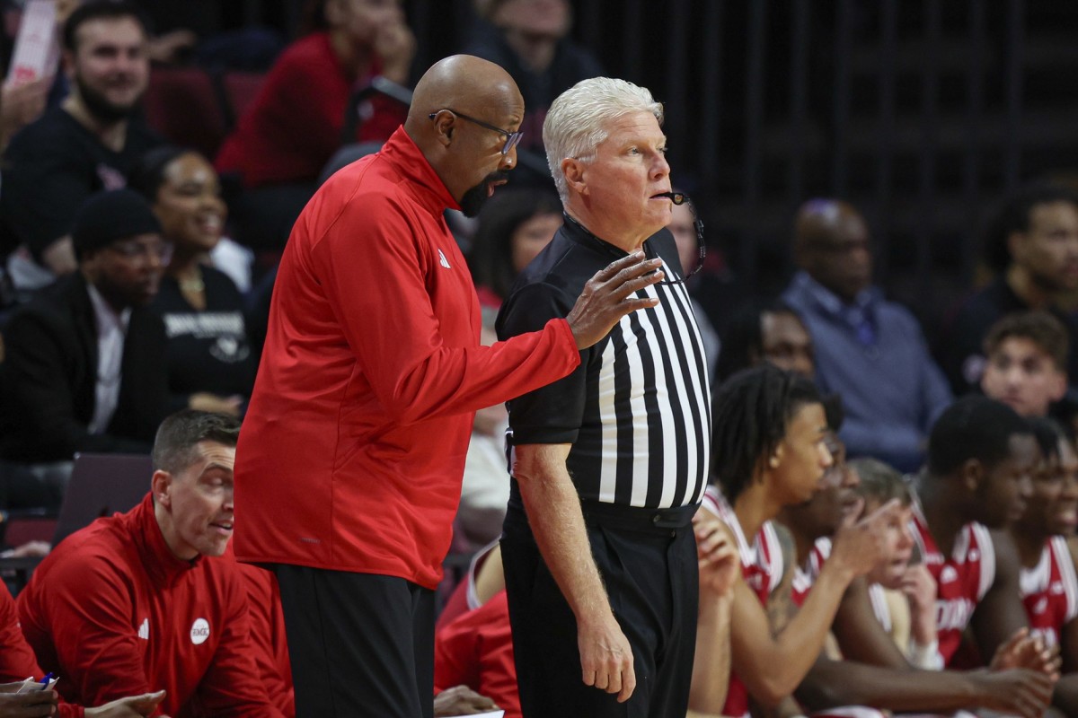 Indiana Hoosiers head coach Mike Woodson talks with an official during the first half against the Rutgers Scarlet Knights at Jersey Mike's Arena.
