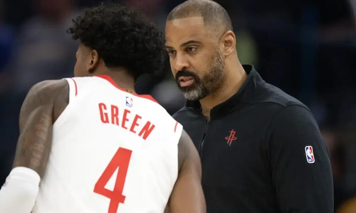 Houston Rockets head coach Ime Udoka talks mid-game with guard Jalen Green