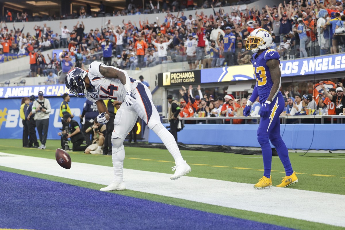 Dec 10, 2023; Inglewood, California, USA; Denver Broncos wide receiver Courtland Sutton (14) celebrates during the second half after scoring a touchdown against the Los Angeles Chargers at SoFi Stadium. Mandatory Credit: Yannick Peterhans-USA TODAY Sports  