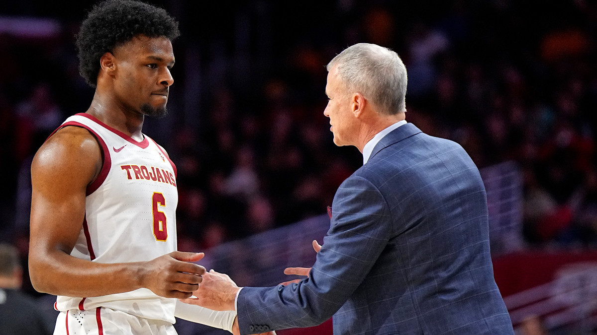 Bronny James with Head Coach Andy Enfield during USC’s game against Stanford.