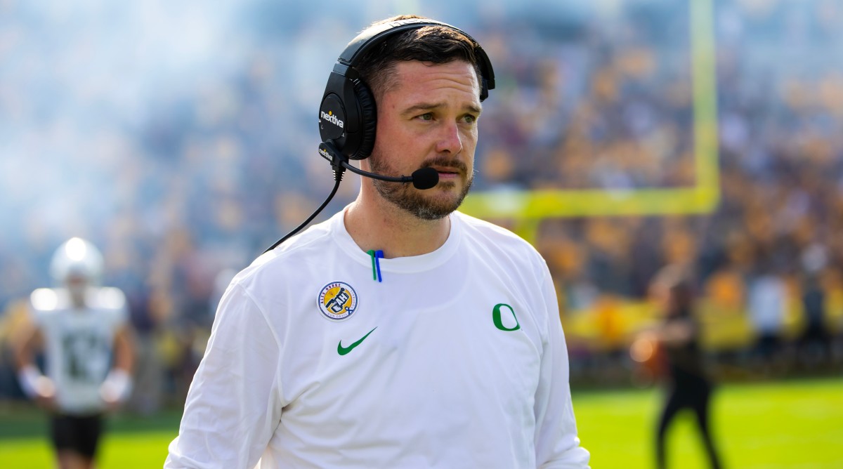 Oregon Ducks head coach Dan Lanning looks on from the sideline during a game against the Arizona State Sun Devils.