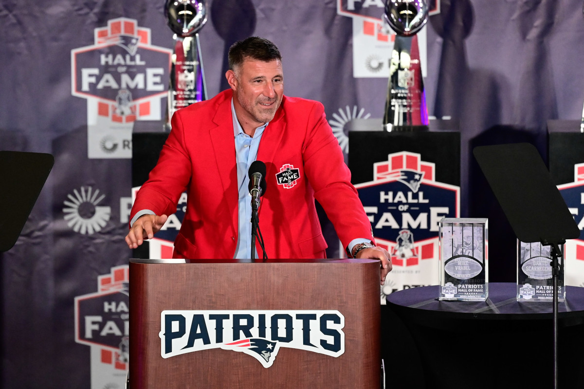 Oct 21, 2023; Foxborough, MA, USA; New England Patriots former linebacker and current Tennessee Titans head coach Mike Vrabel makes a speech at his 2023 Patriots Hall of Fame induction in the Cross Insurance Pavilion at Gillette Stadium. 
