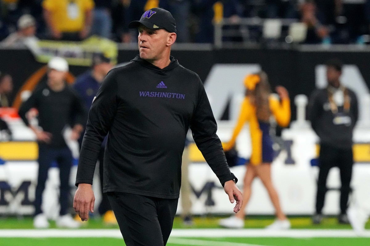 Washington Huskies head coach Kalen DeBoer walks on the field before playing against the Michigan Wolverines in the 2024 College Football Playoff national championship game at NRG Stadium.