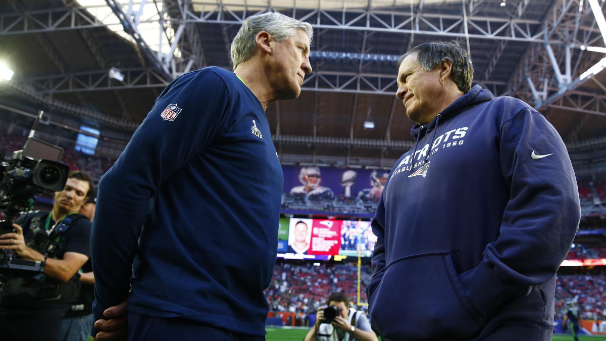 Pete Carroll and Bill Belichick speak before Super Bowl XLIX