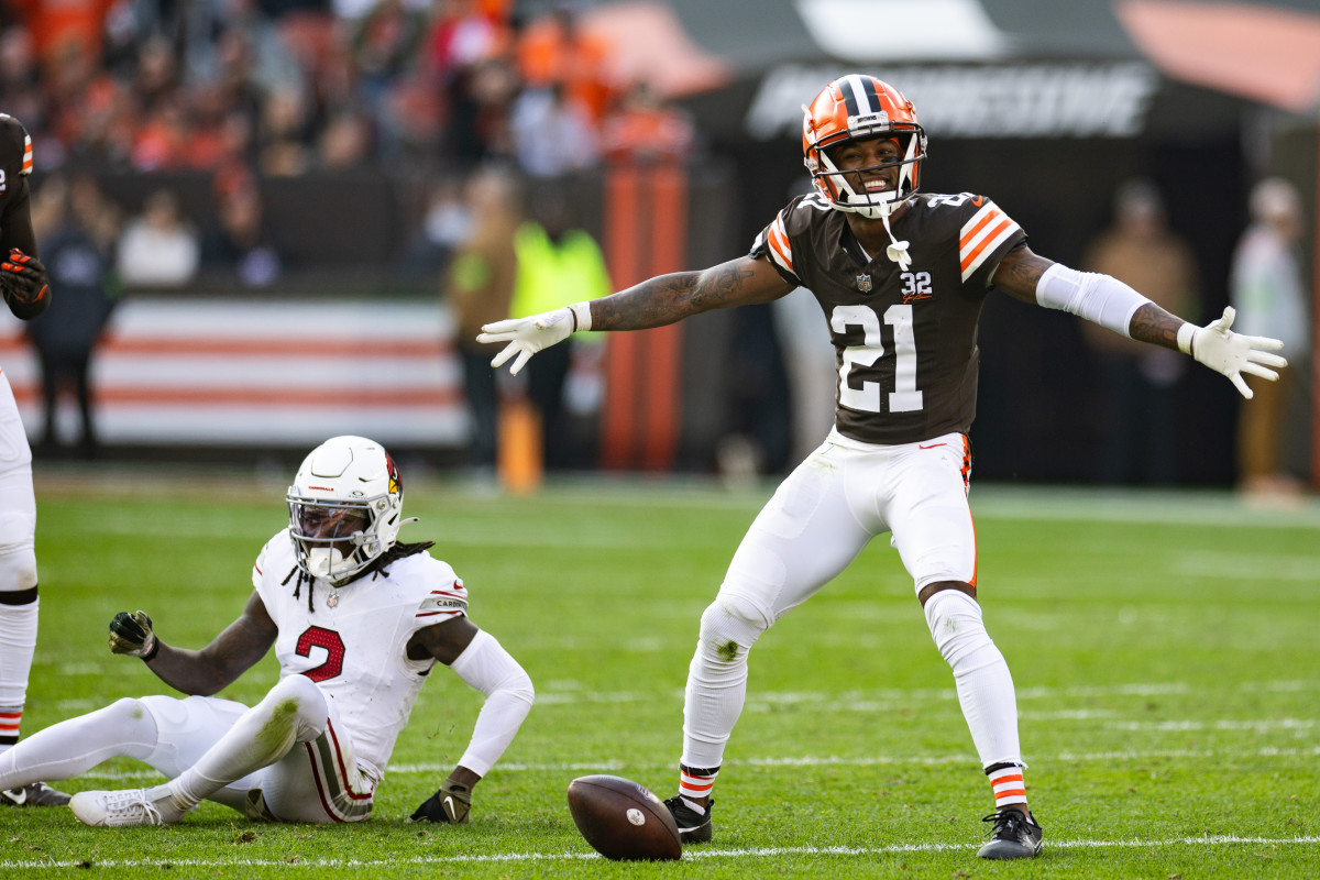 Nov 5, 2023; Cleveland, Ohio, USA; Cleveland Browns cornerback Denzel Ward (21) celebrates his broken up pass intended for Arizona Cardinals wide receiver Marquise Brown (2) during the third quarter at Cleveland Browns Stadium.
