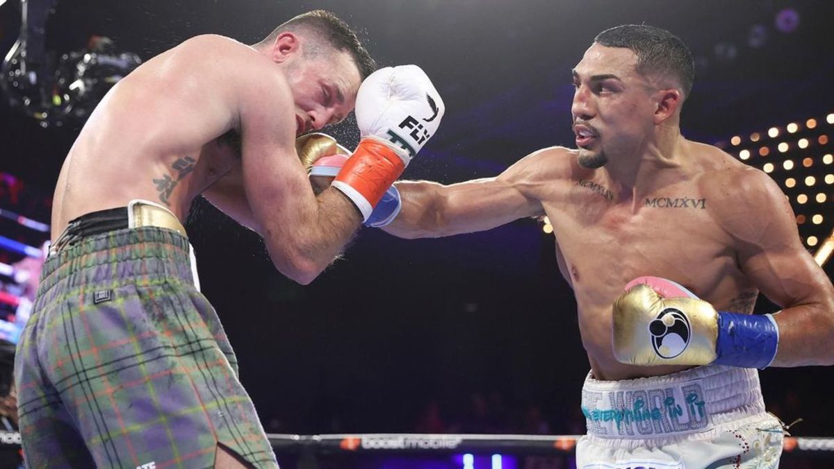 Josh Taylor (red tape) takes on Teofimo Lopez (blue tape) in a welterweight bout. WILLIAMS PAUL/ICON SPORTSWIRE VIA GETTY IMAGES.