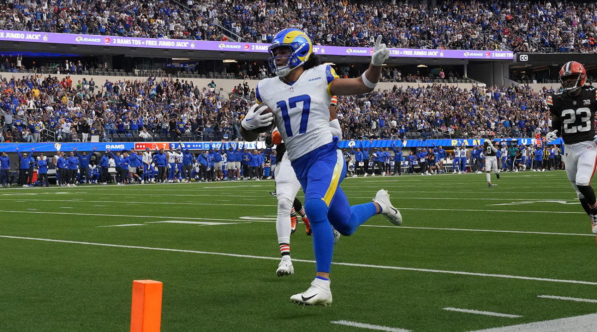 Puka Nacua runs toward the end zone for a touchdown against the Browns