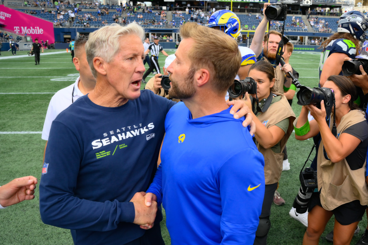 Sep 10, 2023; Seattle, Washington, USA; Seattle Seahawks head coach Pete Carroll and Los Angeles Rams head coach Sean McVay shake hands after the game at Lumen Field.