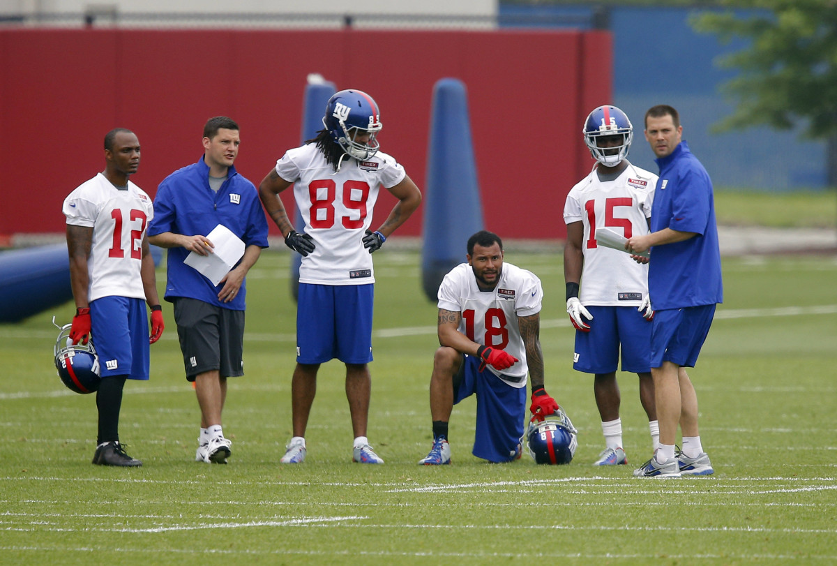 Coach Gilbride (right) in 2013 with the New York Giants wide receivers