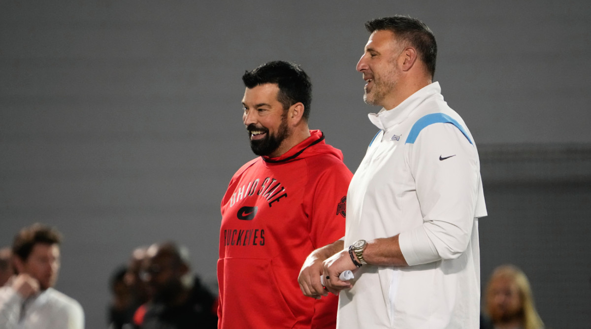 Ohio State coach Ryan Day speaks to Tennessee Titans coach Mike Vrabel at the Buckeyes’ pro day in 2022.