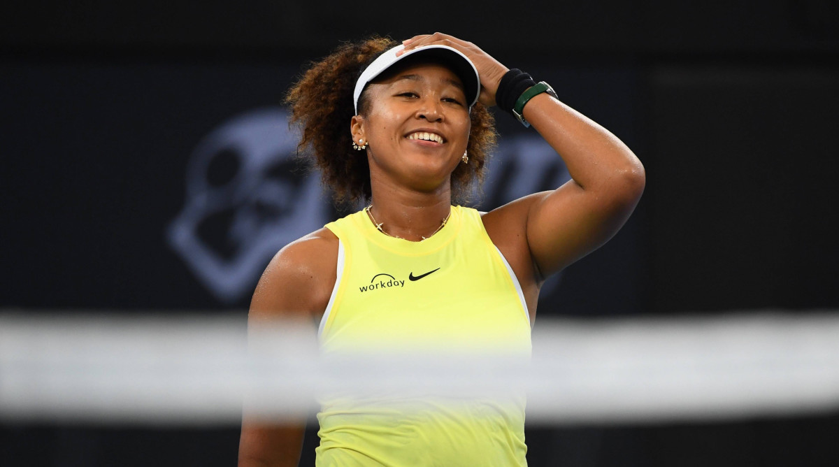 Naomi Osaka reacts after winning her match against Tamara Korpatsch during the first round of the Brisbane International.