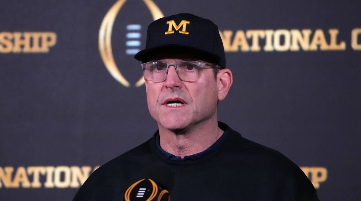 Michigan head coach Jim Harbaugh speaks with the media at a press conference after the national championship.