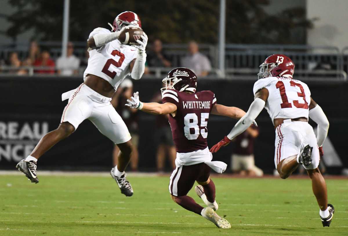 Sep 30, 2023; Starkville, Mississippi, USA; Alabama Crimson Tide defensive back Caleb Downs (2) steps in and picks off a pass intended for Mississippi State Bulldogs wide receiver Creed Whittemore (85) with Alabama Crimson Tide defensive back Malachi Moore (13) on coverage in Davis Wade Stadium at Mississippi State University. Alabama defeated Mississippi State 40-17. © Gary Cosby Jr. / USA TODAY NETWORK