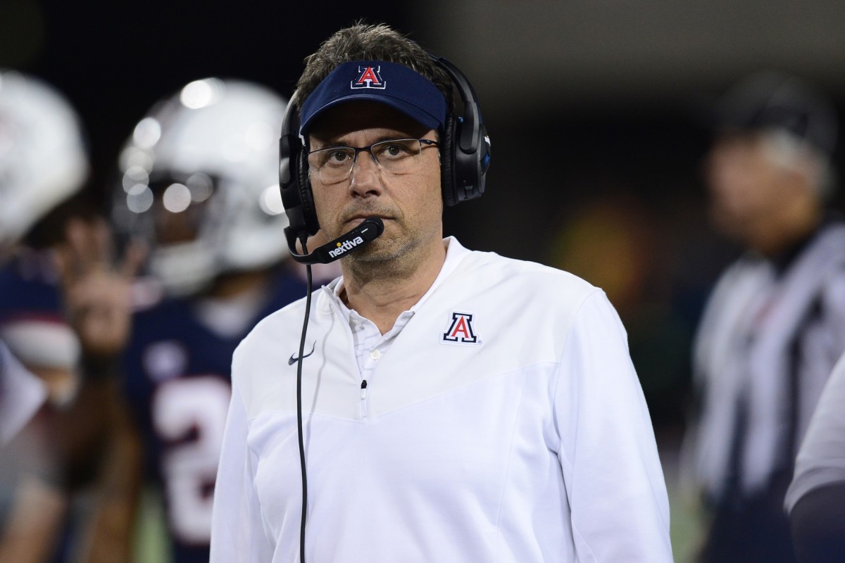 Jedd Fisch offers a stoic expression during the Arizona-UW game in October.