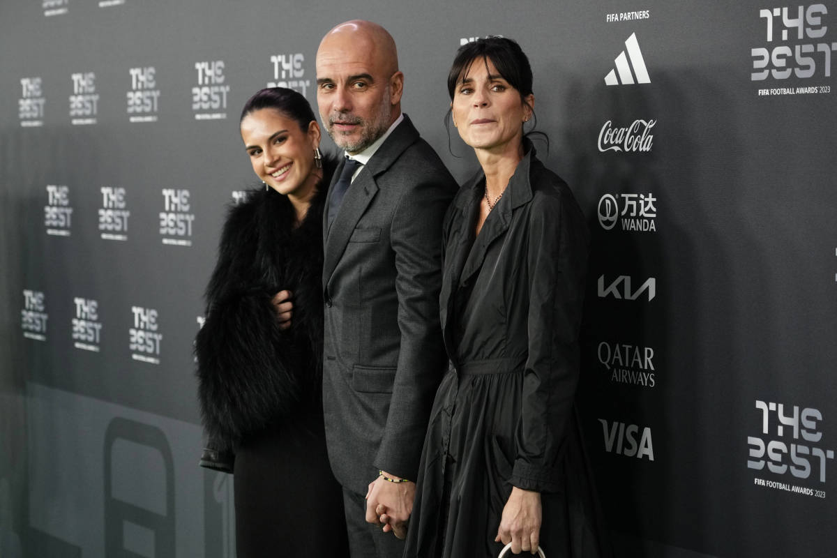 Manchester City manager Pep Guardiola pictured (center) at The Best FIFA Football Awards 2023 alongside his wife Cristina Serra (right) and their daughter Maria (left)