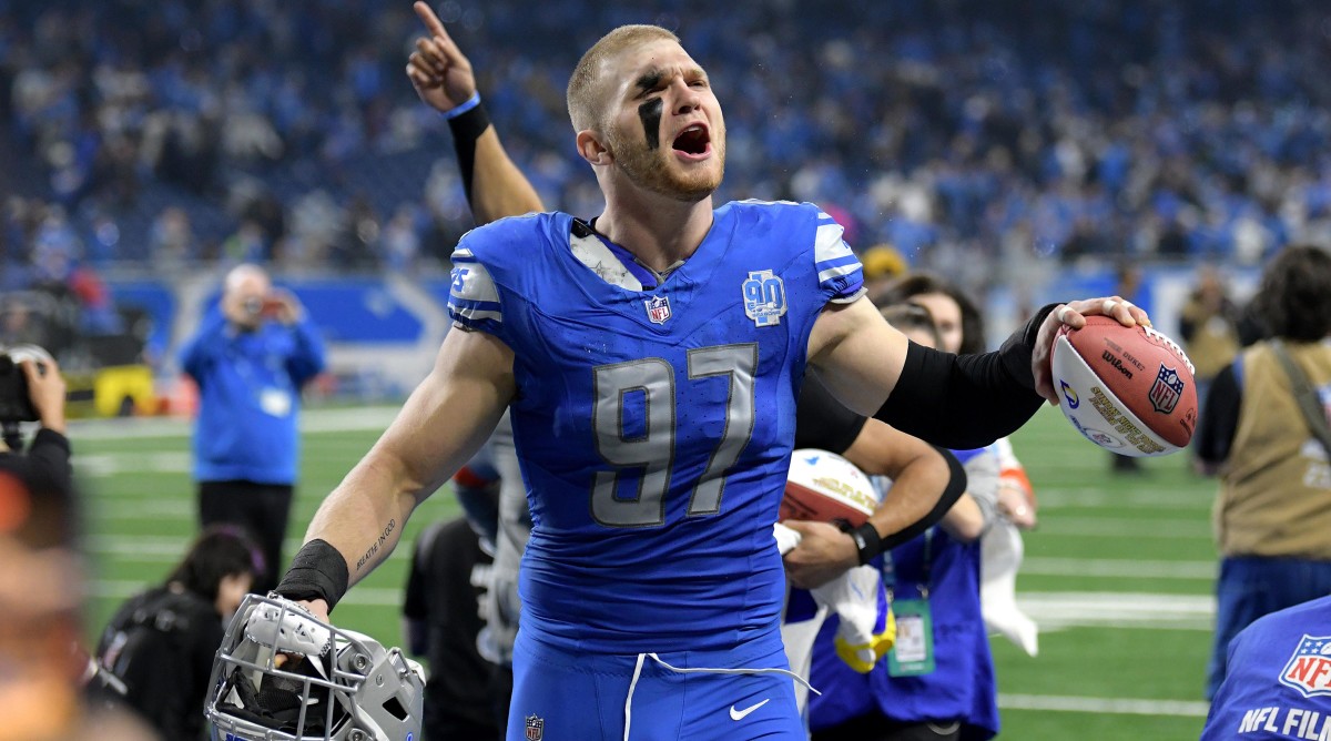Detroit Lions defensive end Aidan Hutchinson (97) celebrates after a 2024 NFC wild card game against the Los Angeles Rams at Ford Field.