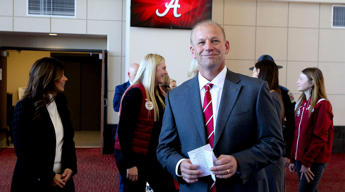 Kalen DeBoer smiles at his Alabama introductory press conference.