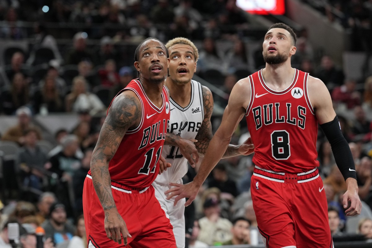 Chicago Bulls forward DeMar DeRozan (11) and guard Zach LaVine (8) block out San Antonio Spurs forward Jeremy Sochan (10) in the second half at Frost Bank Center. 