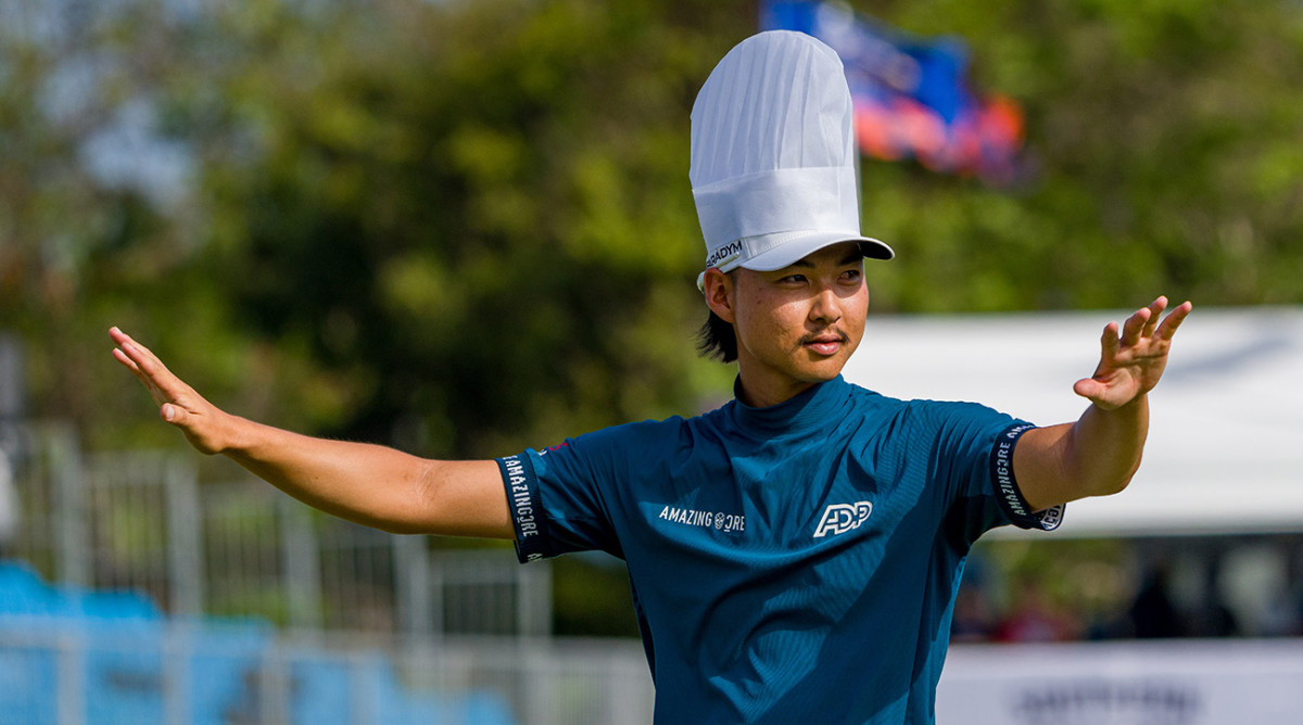 Min Woo Lee of Australia wears a chef hat and celebrates with the crowd on the 17th green during day four of the 2023 Australian PGA Championship at Royal Queensland Golf Club on November 26, 2023 in Brisbane, Australia.