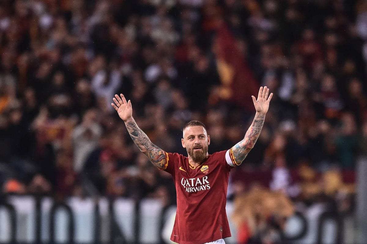 Daniele De Rossi pictured waving to fans at the end of his final appearance for Roma as a player in May 2019