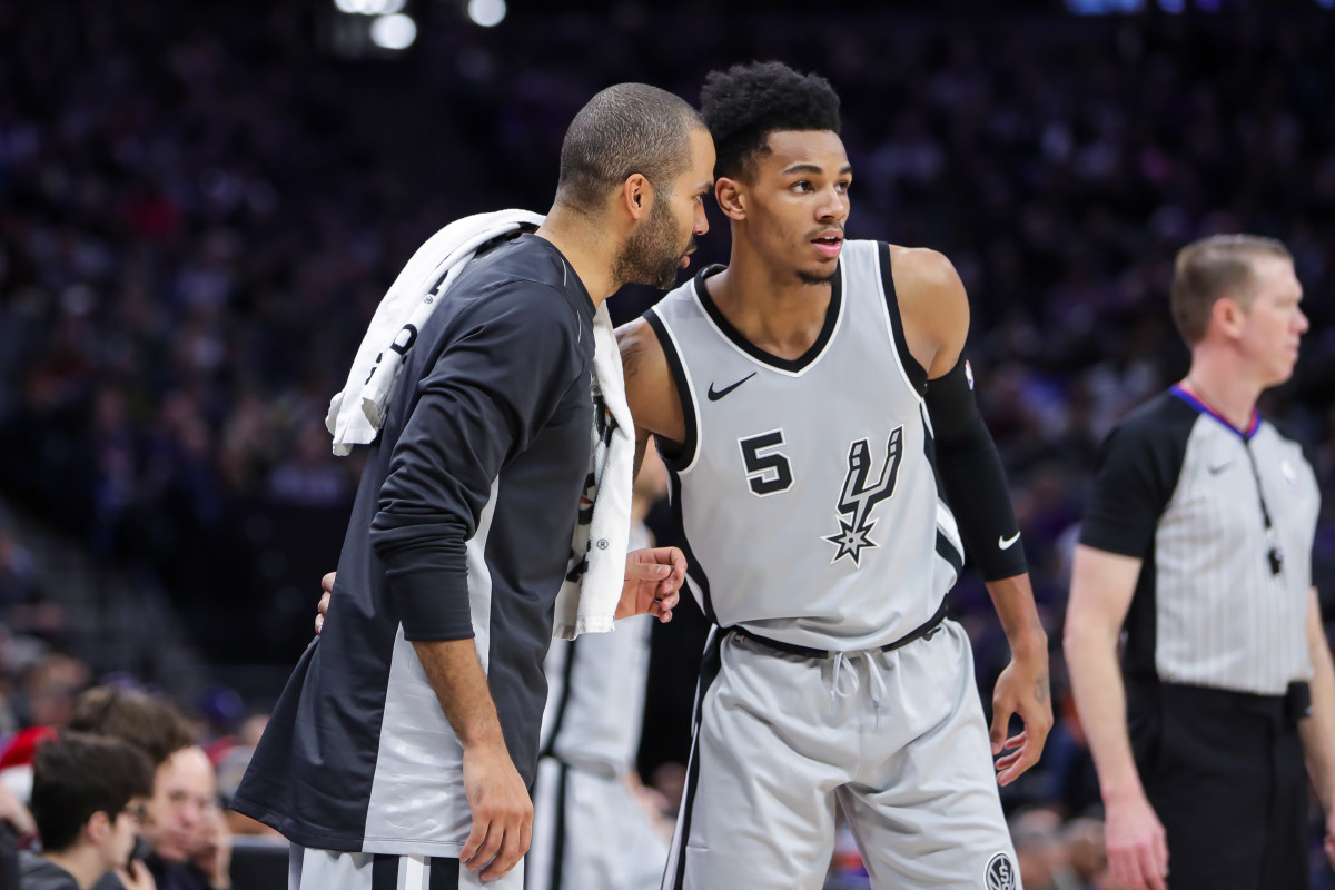 Dec 23, 2017; Sacramento, CA, USA; San Antonio Spurs guard Tony Parker (9) and guard Dejounte Murray (5) during the game against the Sacramento Kings at Golden 1 Center.