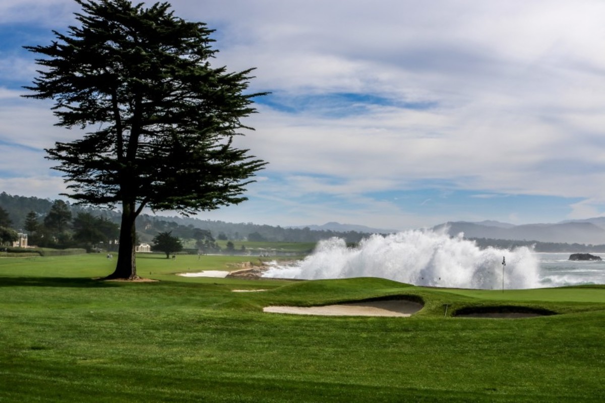 The par-5 18th hole at Pebble Beach Golf Links is considered one of the most beautiful in all of golf, as it doglegs along the rugged coastline of Carmel Bay and features a towering Monterey Cypress tree near the 18th green. For these reasons many consider No. 18 the signature hole over the seventh and history-ladened 17th holes, both par 3s.